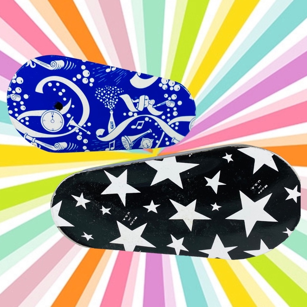 Two vintage tin New Years Eve royal blue and  black cocktail print noise makers